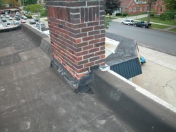 Parapet chimney flashing rooftop